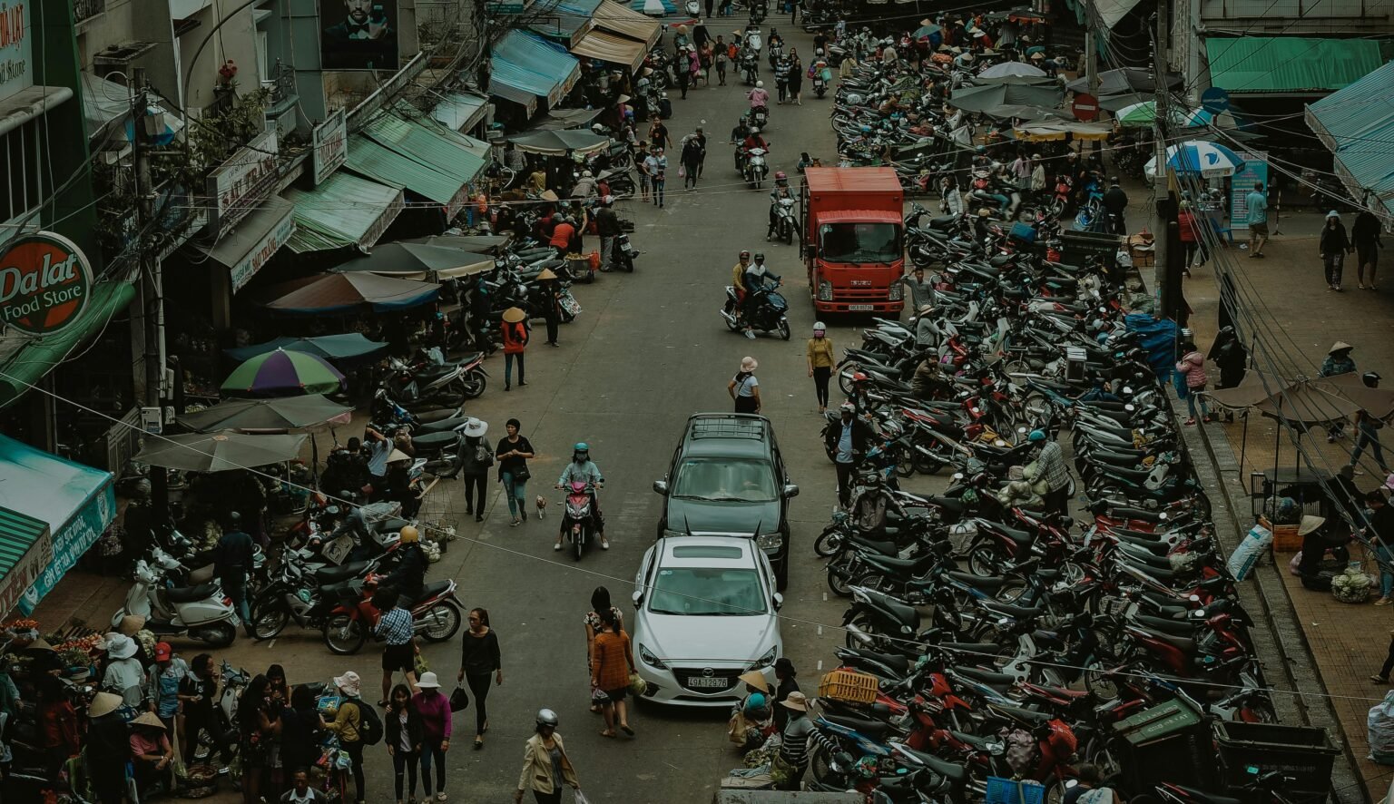 People walking through a local market in the Philippines after the earthquake