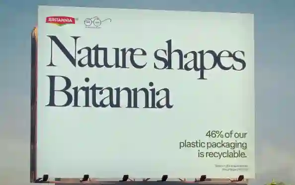 Billboard displaying Britannia Industries' message “Nature shapes Britannia,” highlighting the company’s focus on recyclable packaging.