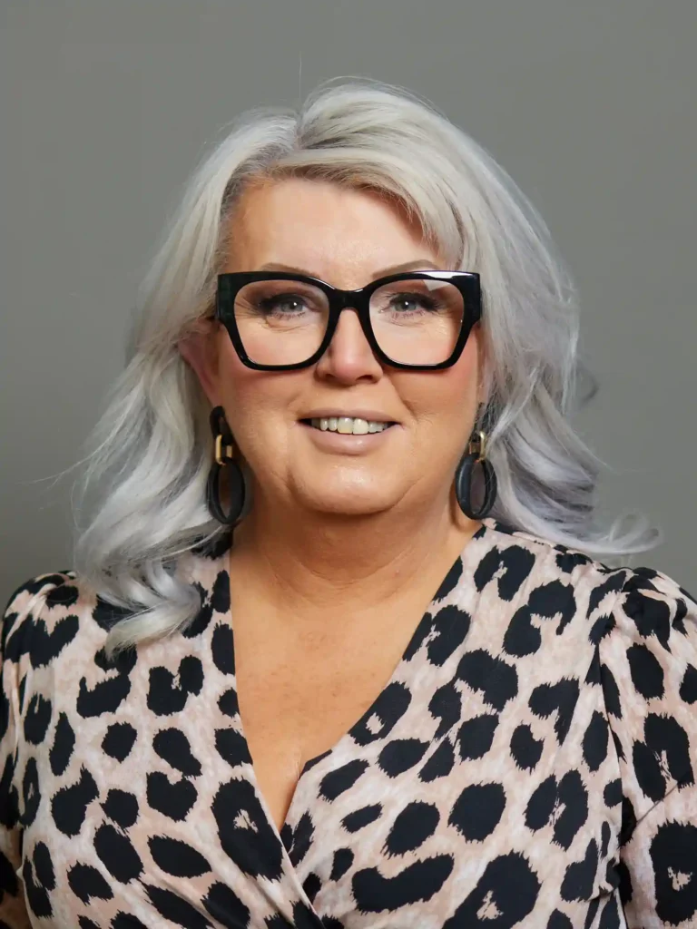 Portrait of Baroness Helen Newlove, looking forward with a composed and serious expression.