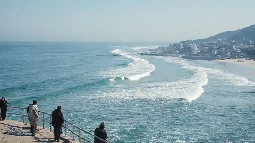 Coastal area in Iwate after the Japan earthquake with people observing the shoreline.