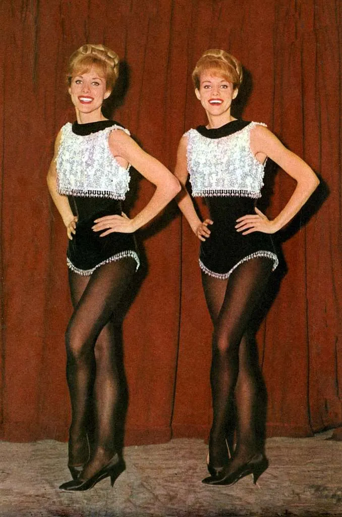 Vintage 1965 public domain photo of the Kessler Sisters posing in matching stage costumes, used in an article about the Kessler Twins death.