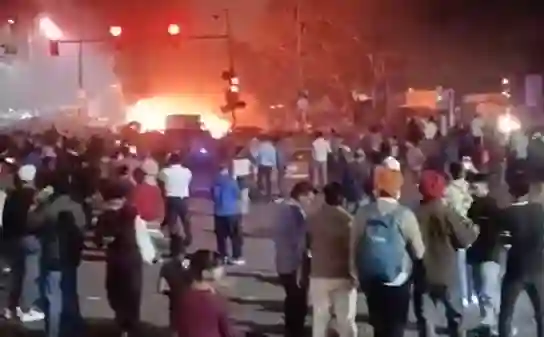 Smoke and flames rising from vehicles after Red Fort Metro blast in Delhi