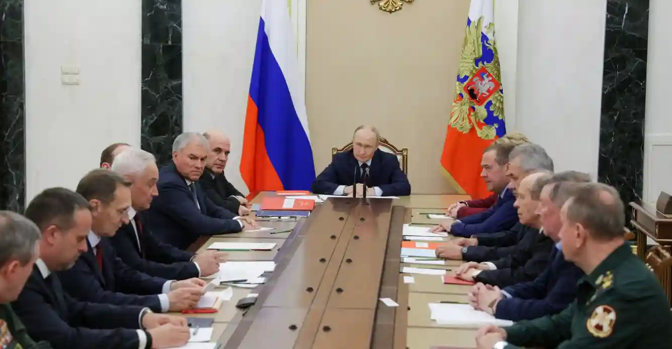 Putin during a high-level security meeting discussing Russia nuclear testing plans.