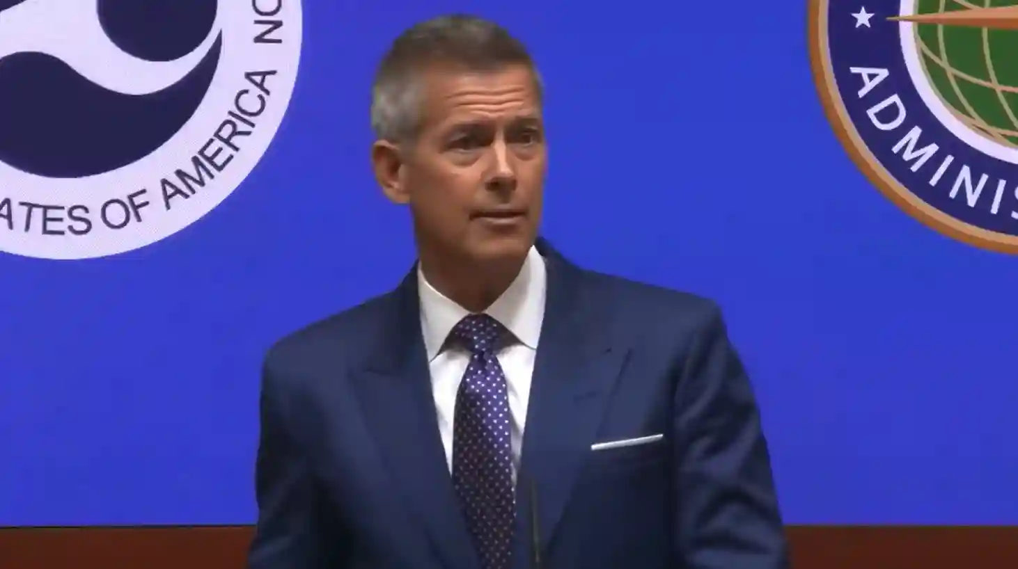 Transportation Secretary Sean P. Duffy addressing the media about US flight reductions and airspace safety measures.