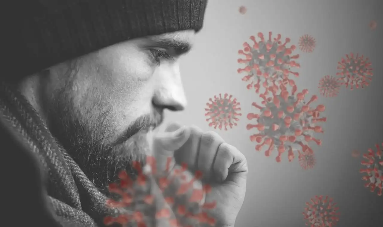 A man covering his mouth while coughing, with virus illustrations highlighting flu deaths in USA during the 2025–26 flu season.