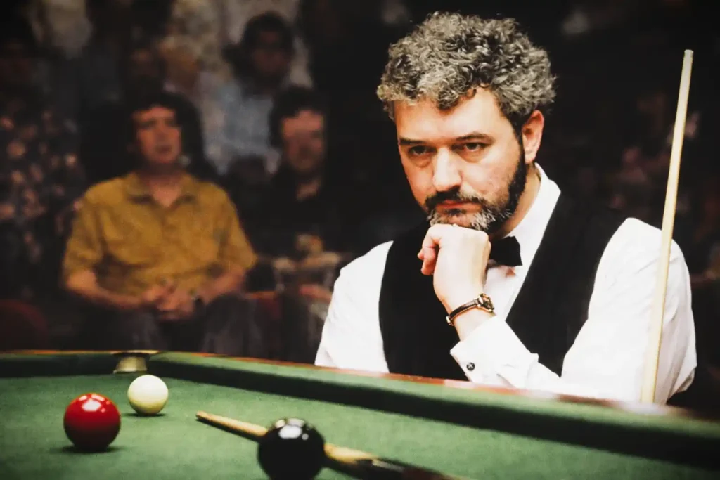 John Virgo concentrating during a professional snooker match before the John Virgo death