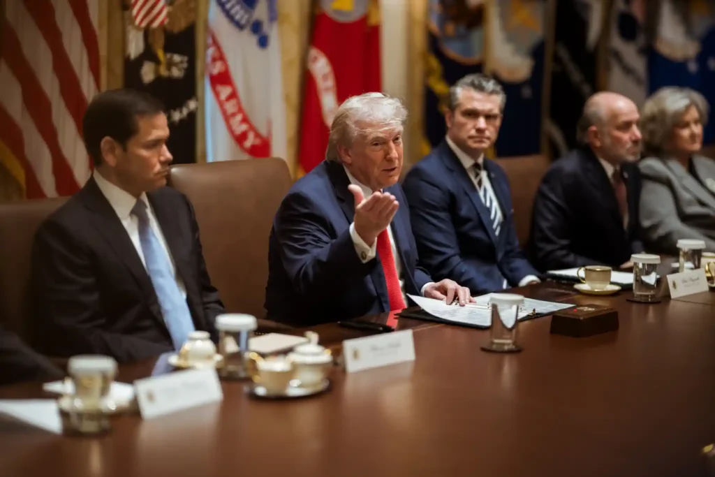 Donald Trump speaks during a cabinet meeting at the White House, reflecting Trump foreign policy strategy and leadership decisions