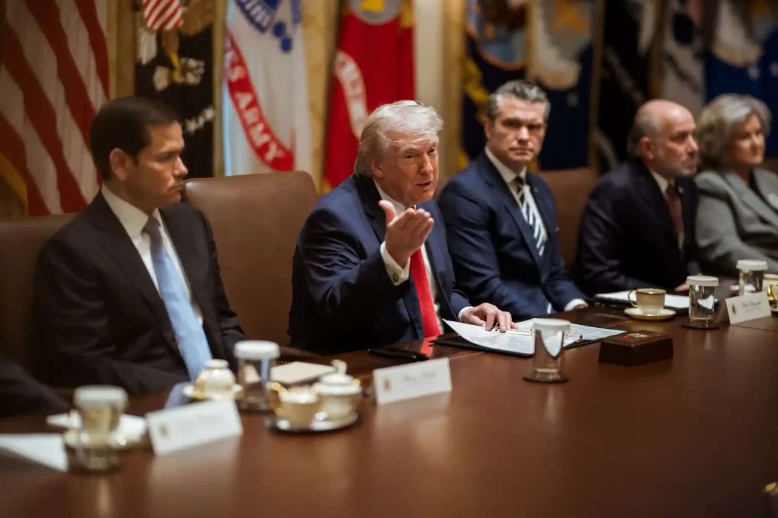 Donald Trump speaks during a cabinet meeting at the White House, reflecting Trump foreign policy strategy and leadership decisions